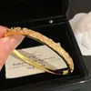 ¡Flores Radiantes! Pulsera de Zirconia con Patrón Chapada en Oro Real de 18K Estilo Nacional Chino Anillo de Mano Lujo Ligero Sensación de Alta Gama Joyería de Mano