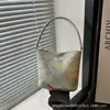 Bolsa Grande de Nova Textura para Comércio Exterior Tendência Feminina Moda Bolsa Tote Couro Macio Retrô Versátil para Viagem Bolsa de Ombro de Mão