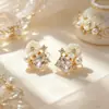 Brincos de moda flor pérola cristal estilo floresta, doces e artísticos, luxo leve com toque de alta qualidade, design de nicho, brincos versáteis