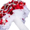 Fornecedor direto de fábrica suprimentos de casamento noiva de flanela Rosa segurando flor flor artificial adereços de fotografia atacado