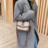 Bolso de mujer 2026 nuevo modelo, bolso cuadrado pequeño estampado retro de nicho moderno y a la moda, bolso cruzado de hombro de alta gama