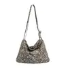 Bolso tote de moda y tendencia con estampado de leopardo de gran capacidad para mujer, nuevo modelo 2026, ligero y versátil para ir al trabajo, bolso de hombro y cruzado