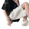 Pantalones cortos de moda para hombre de verano, tejido gofrado personalizado a la moda, pantalones cortos rectos holgados de color liso, estilo de celebridad de internet