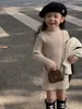 Suéter Base de Longitud Media para Niñas Otoño e Invierno 2026 Nuevo Estilo Coreano Suéter de Punto Cálido Vestido Jersey de Moda