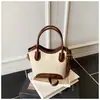 Bolso Cubo de Moda Versátil con Diseño Mate para Mujer 2025 Invierno Nuevo Estilo Elegante Bolso de Hombro Cruzado con Bloques de Color