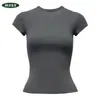 Camiseta feminina de verão de manga curta com design de ombro reto, acinturada e modeladora, corte sereia estilo coreano, caimento justo, top curto sexy, moda transfronteiriça
