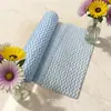 Tela no tejida spunlace textura de malla paño de limpieza engrosado paño para lavar platos patrón de ondas amarillo-verde azul-amarillo fabricante de fuente de tela