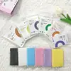 Película de tarjeta para palomitas de maíz Yiwu 20 Álbum de seda película protectora Cubierta protectora para tarjeta pequeña de tres pulgadas Película protectora Polaroid