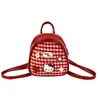 Mochila casual infantil estilo coreano 2026 nuevo cuadros rojos gato estilo coreano moderno linda caricatura moda mochila
