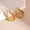 Europa y Estados Unidos aretes de aro ovalados retorcidos multicapa transfronterizos moda temperamento personalidad aretes lujo ligero alta gama aretes al por mayor