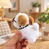 Pelúcia fofa de cachorro de leite desenho animado olhos sininho boneca boneca de presente bolsa chaveiro pingente atacado