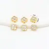 Aretes de Trébol de Cuatro Hojas de Color Conservante 14K Nicho Zirconia de Alta Gama Espaciador de Engranaje Rellenos de Oro Espaciador C45