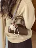 Moda Primavera 2026 Diseño de Nicho Bolso Cruzado de un Solo Hombro para el Trabajo y los Viajes Cotidianos Bolso Pequeño Cilíndrico Retro para Mujer