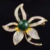 Broche de perla de flor pequeña mate Youzun Pin de platino azul de alta gama coreano Ramillete de flor joyería para ropa al por mayor