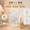 Espejo de maquillaje LED Hollywood en stock con 6 bombillas, que cuenta con una mesa de almacenamiento, una función de carga y está disponible para personalización transfronteriza