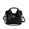 Bolso de Moda Urbano Minimalista con Patrón de Diamantes 2026 Primavera Versátil Nuevo Bolso Cruzado para Mujer para el Trabajo y los Viajes Bolso Cubo