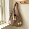 Bolso de mano nuevo transfronterizo casual de verano gran capacidad bolsa de playa bolsa de lana bolsa tejida hueca de estrella de mar bolso de mujer