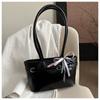 Bolsa Feminina Casual 2025 Nova Moda High-End Axila Ombro Bolsa Moda Nicho Bolsa de Mão para Trabalho