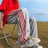 Pantalones deportivos con rayas laterales para parejas de hombres y mujeres, pantalones de verano, pantalones rectos holgados de moda estilo Hong Kong, pantalones casuales de corte bajo.