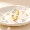 Novo produto de estilo europeu e americano transfronteiriço: anel de aço inoxidável com zircônia microincrustada para homens, anel de diamante para casais, joias de mão populares atacado
