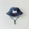 Sombrero de Bebé Qiunan Primavera Otoño 2026 Nuevo Lindo Gato Sombrero de Pescador de Mezclilla Protección Solar para Niña