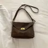 Primavera de 2026 Nova Moda Coreana Estilo Preguiçoso Fivela de Trava Bolsa de Ombro Único Sob o Braço Couro Macio Retrô Bolsa para o Dia a Dia Bolsa Transversal para Mulheres