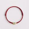 Pulseira de corda vermelha ano de nascimento Minsheng novo estilo imitação de jade Hetian feminina contas da sorte pulseira trançada design de nicho ins