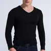 Camiseta de manga larga para hombre Camiseta de hombre con cuello en V otoño e invierno manga larga camisa interior casual color liso explosiones una generación de pelo