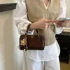 Bolso tipo almohada versátil de nicho de moda transfronterizo 2026 nuevo modelo bolso de mano de alta gama bolso cruzado para el trabajo y los desplazamientos bolso de hombro