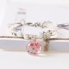 Dulce diseño pulsera roja estrellada conjunto de pendientes flor seca adulto estudiante mujer cuerda \puesto puesto suministro