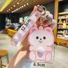 Monedero con llavero de Sanrio con dibujos animados, minibolso de almacenamiento para auriculares, regalo al por mayor