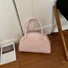 Bolso de axila para mujer, nueva colección de verano 2026, diseño de nicho, exquisito estampado de lunares, bolso de hombro, adecuado para ir al trabajo, bolso de mano tipo concha