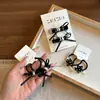 Diadema Negra con Estrella y Lazo Cola de Caballo Niña Linda Cuerda Elegante para el Cabello Clip Lateral de Dibujos Animados para Niños Mechones Sueltos