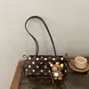 Elegante y moderno bolso de mano para mujer, colección nueva 2026, versátil para el trabajo, bolso de hombro ligero y chic, elegante bolso de axila