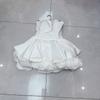 Vestido Hepburn Cruzado Europeu e Americano Estilo 2025 Verão Novo Peito Amarrado Tridimensional Rosa Branca Manga Bufante Pequena