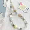 Estilo Xiaohongshu estilo ins série creme cordão de celular DIY feito à mão com contas corda anti-perda ccd enfeites para câmera