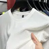 2026 Camiseta Lisa de Manga Corta y Cuello Redondo Tejido Waffle de Moda Nueva Camiseta de Malla de Verano para Hombre Ropa de Verano Seda de Hielo