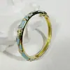 Yongge Jewelry Pulsera de Cloisonné Transfronteriza Pulsera Delgada con Borde Dorado y Esmalte de Goteo Estilo Étnico Versátil Floral Esmalte Joyería Hecha a Mano