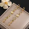 Pendientes Largos Dinámicos con Colgante de Gota de Agua de Diamantes de Colores Estilo Palacio con un Toque de Lujo Ligero y de Alta Gama, Pendientes de Aro Turcos de Moda