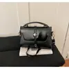 Riñonera minimalista de moda transfronteriza, nuevo estilo coreano de piel sintética, moderna y refinada, diseño casual, cruzada o de mano, bolso cuadrado pequeño