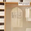 Nueva funda antipolvo para ropa de tela no tejida gruesa, visible para chaqueta y traje, bolsa para guardarropa colgante estéreo