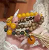 Pulsera de madera de agar, accesorio cultural de madera, hebilla de paz de ámbar y hueso de camello de segunda generación, borla de doble bucle, con bloques de color, elegante y vintage para mujer