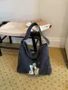Bolso de hombro moderno y a la moda 2026 nuevo vintage versátil de gran capacidad bandolera para estudiantes, para ir al trabajo y para viajar bolso de mano