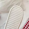 Pantuflas de felpa al por mayor para otoño e invierno para mujer, con un lindo diseño de lazo, adecuadas para usar en interiores, proporcionando calidez y con una suela suave y antideslizante