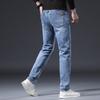 Jeans casuales elásticos para hombre con efecto vintage desgastado, estilo Hong Kong para hombres jóvenes, corte slim, lavado blanco, pantalones largos rectos pequeños