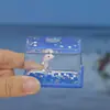Botella de Deriva de Dibujos Animados Mini Pequeña Rectangular Gota de Aceite Flotante Acrílico Transparente Juguete para Niños Regalo de Cumpleaños