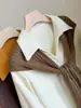 Conjunto de Dos Piezas de Camisa de Pana de Alta Gama y Chal de Punto para Mujer Otoño 2026 Nuevo Suelto Versátil Temperamento Top Tendencia