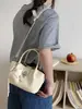 Bolso de mano tipo cubo minimalista popular transfronterizo 2026 primavera-verano nuevo a la moda elegante bolso de hombro moderno para ir al trabajo bolso cruzado