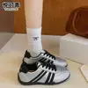 Zapatillas de entrenamiento alemanas de suela plana para mujer 2026 nuevo otoño Forrest Gump zapatillas blancas populares zapatillas deportivas casual de tabla