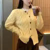 Cárdigan de punto trenzado con botones estilo coreano para mujer, nuevo modelo otoño e invierno 2026, holgado y chic, top adelgazante, ropa de mujer de moda